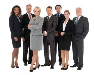 A group of people dressed in "business professional" clothing.